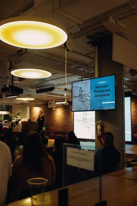 Video production team operating professional camera equipment during a live event shoot